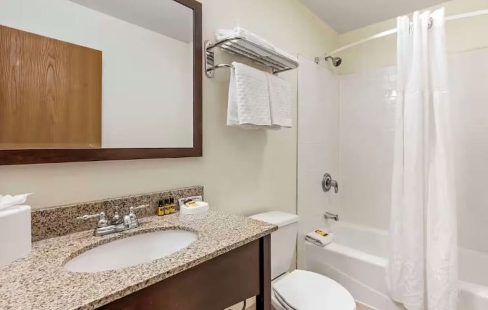 Refresh easily in a bright bath with tub-shower combo.