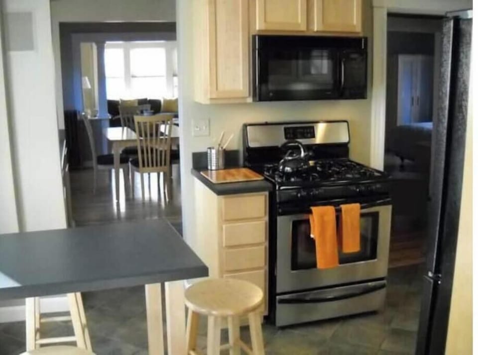 The kitchen island with stools