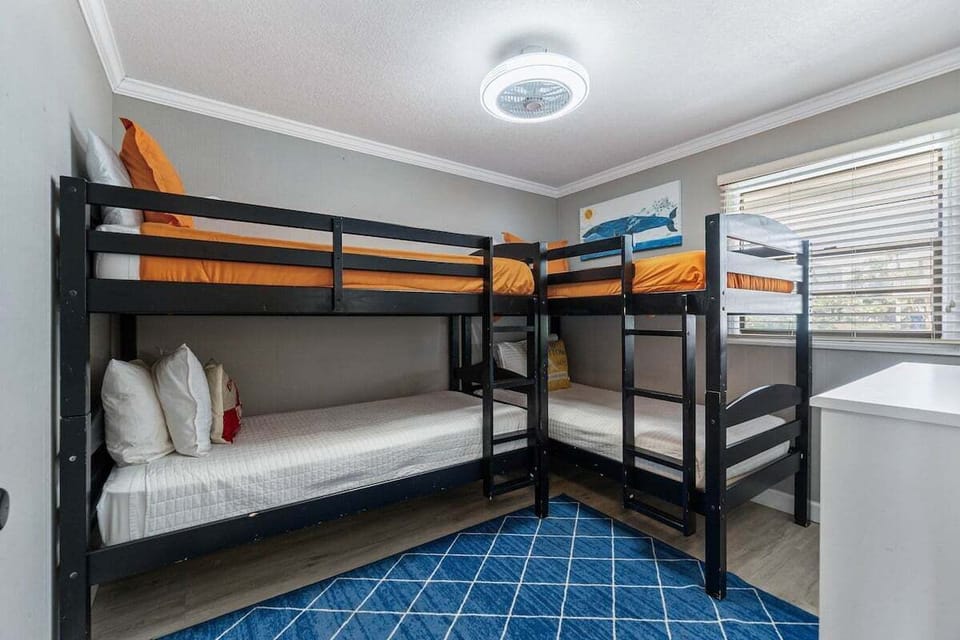The bunk room is a fun and functional space, perfect for kids or extra guests. It features two sturdy bunk beds, comfortably sleeping up to four people.