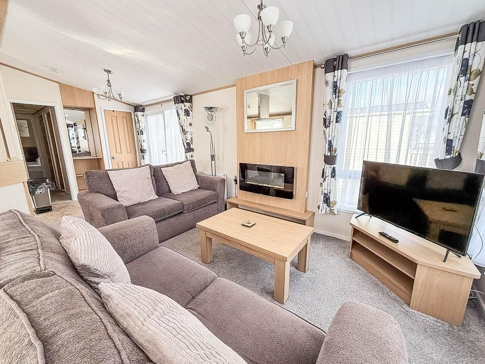Prepare delicious meals with ease using the kitchen amenities before sinking into a comfortable sofa to unwind after a day by the Norfolk beach.