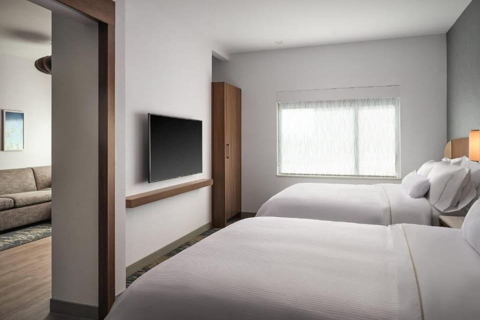 Settle in for movie nights with cozy beds and big TV.