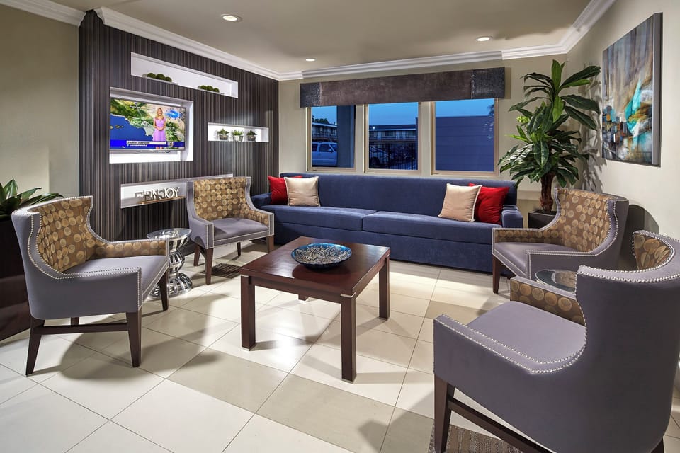 Relax together in the stylish lounge with plush seating.