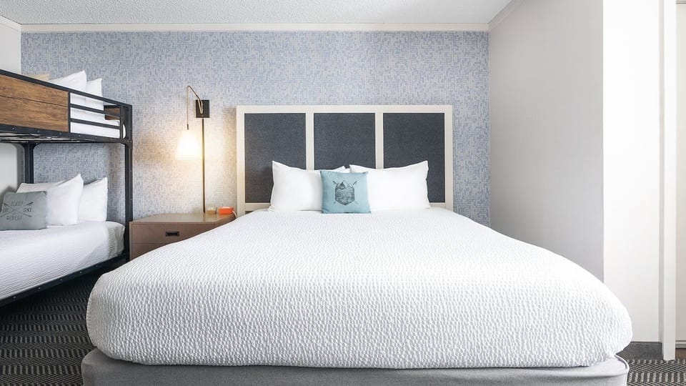 Drift off surrounded by soft light and soothing textures.