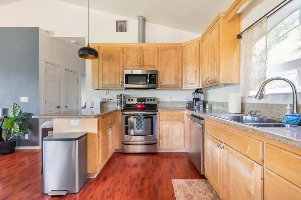 A full kitchen: instant pot, toaster, coffee grinder & maker, kettle, spice rack