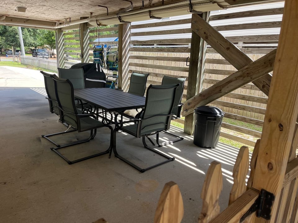 Outside covered patio, great space for enjoying crabs or just grilling out