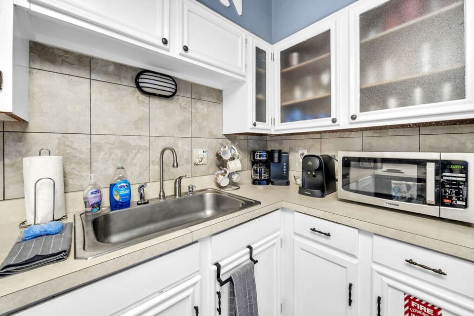 Enjoy the convenience of a fully equipped kitchen with coffee station and all the basics for cooking and dining.