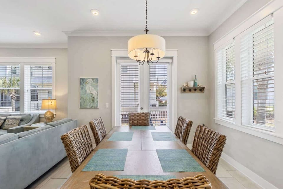 Dining area: Main floor, table seating for 6, 3 barstools at island