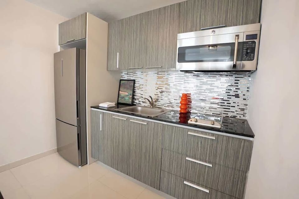 Modern appliances and ample counter space make cooking simple.