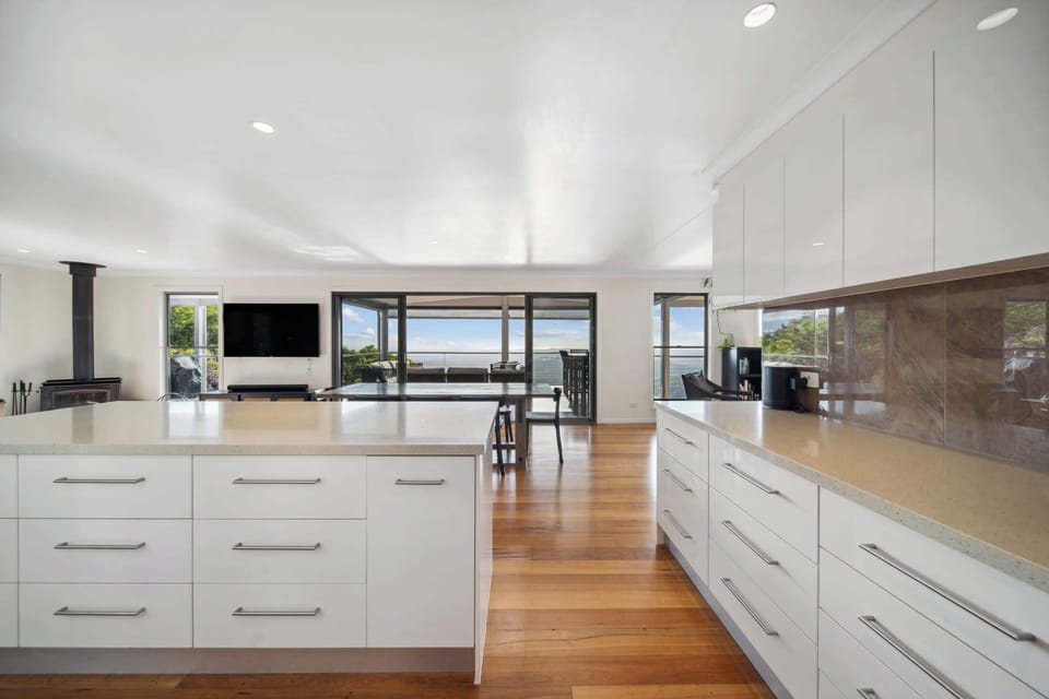 The modern kitchen is fully equipped, including a Nespresso machine for your morning brew.