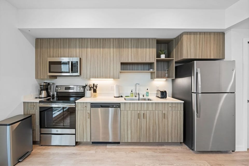 Modern appliances meet convenience in this cooking space.

