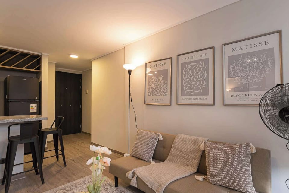 Enjoy a cozy and stylish living area, perfect for relaxation after a day of adventure. Modern decor meets comfort in this inviting space.