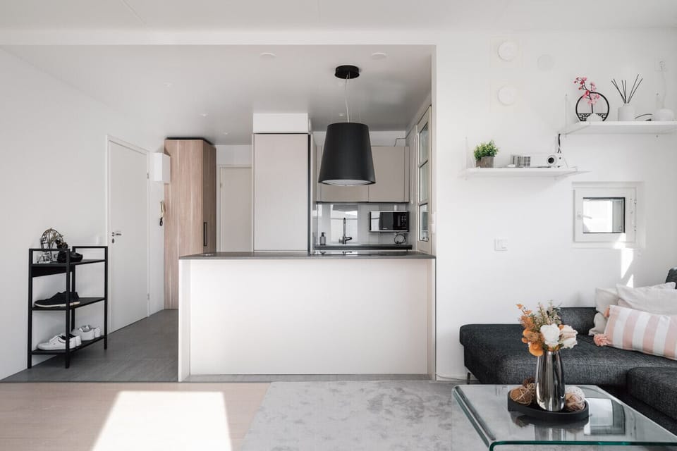 The open kitchen concept allows you to chat with your family and friends while cooking