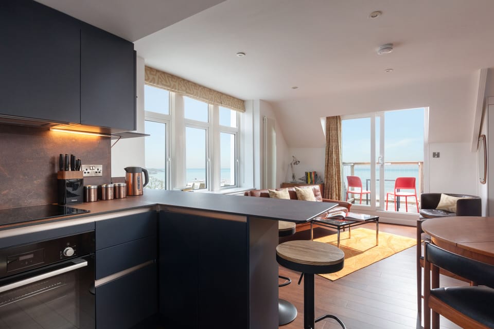 Kitchen breakfast bar with stunning views of castle and sea