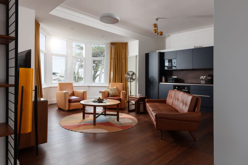 Spacious, warm, bright open plan living and kitchen room with huge sea views