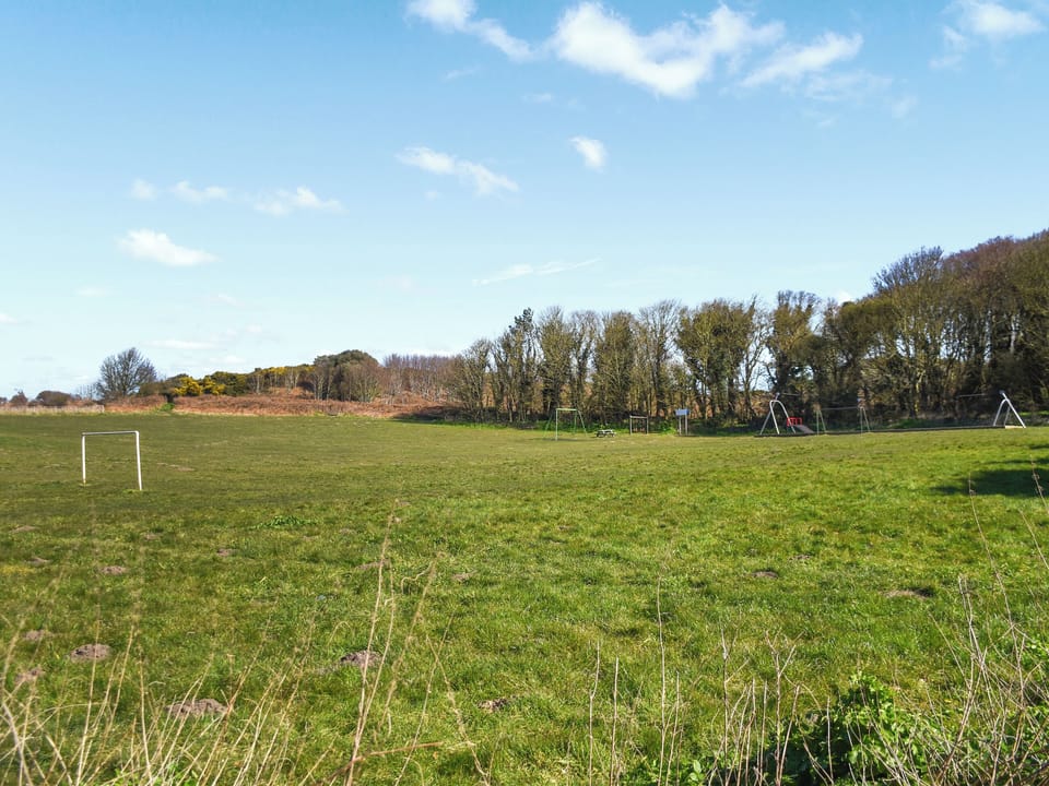 Park and the coastal path is a 2 min walk from the chalet | High Tide, Cromer