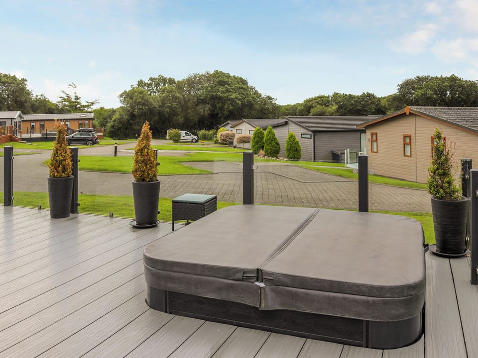 Jacuzzi | Seagrass Lodge, Rhosfawr, near Pwllheli
