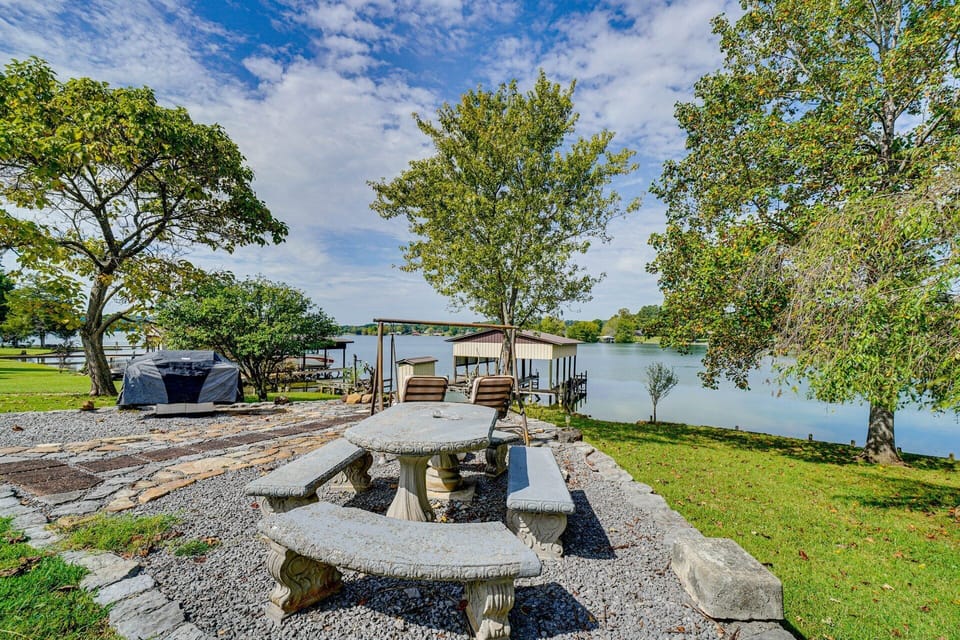 Picnic table, grill, extra seating and fire pit for guest use