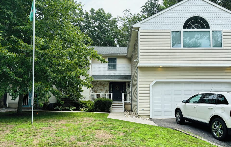 Front entrance with parking