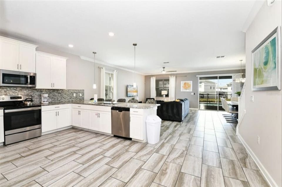 Modern kitchen with open flow, perfect for shared meals.