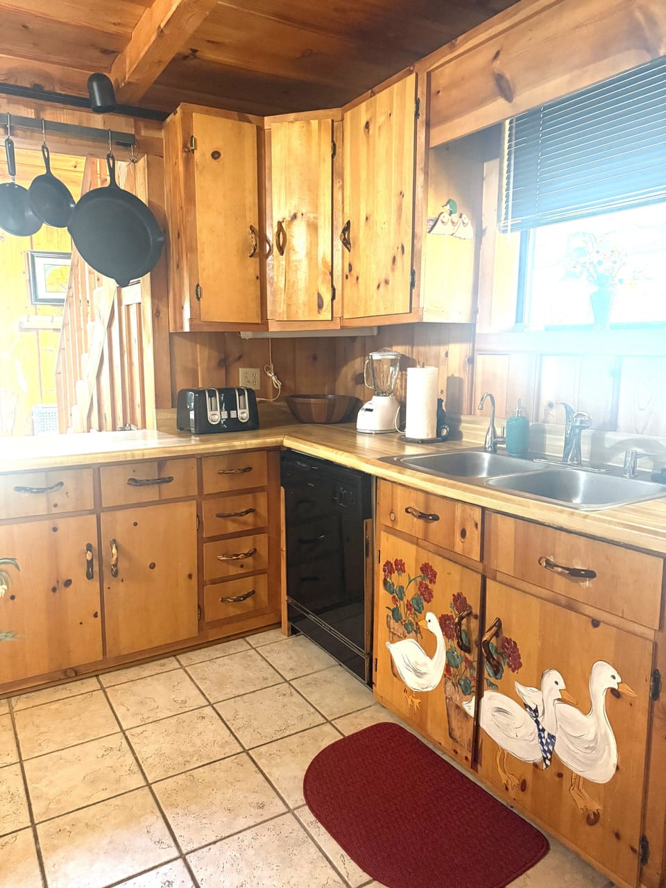 Cheerful Kitchen opens to dining area.
