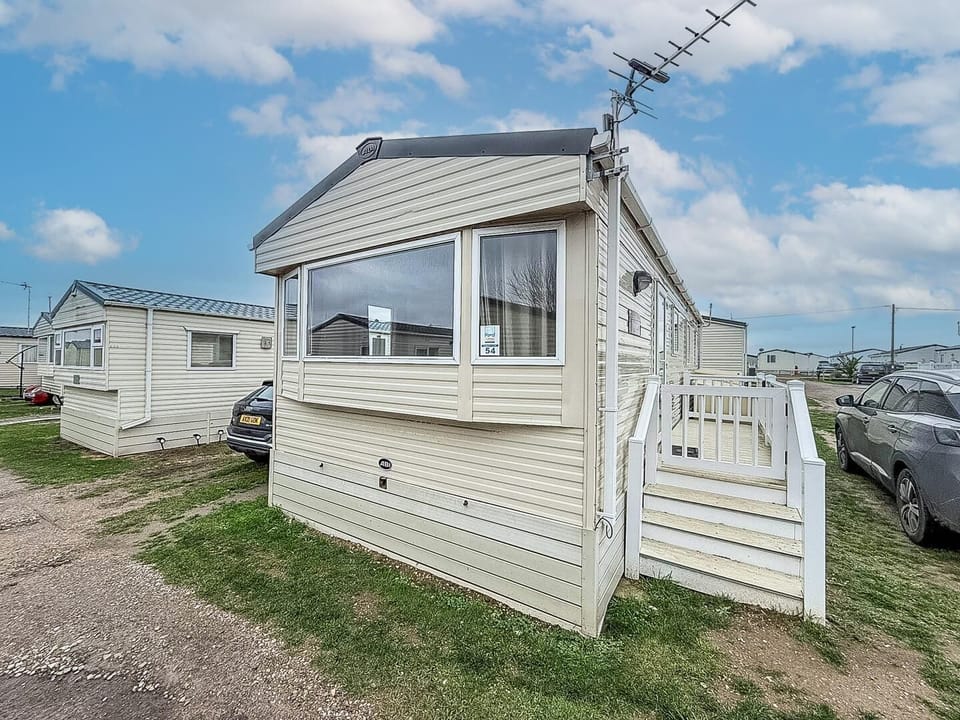 Cozy enclosed porch with panoramic sky views