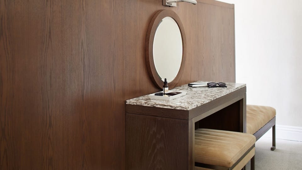 Plan tomorrow’s adventures at a sleek in-room vanity desk.
