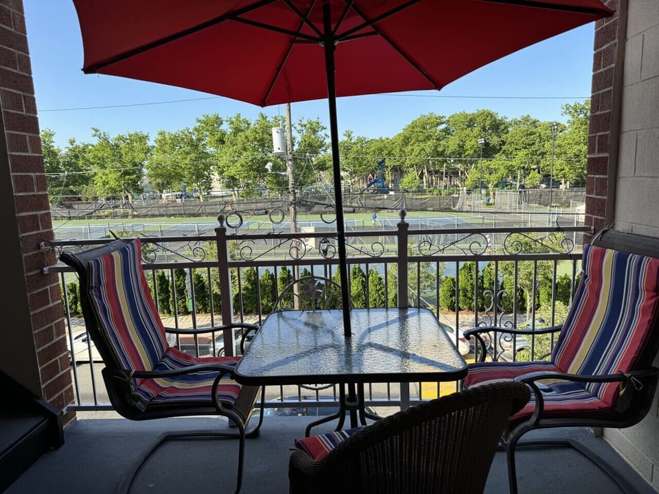 Deck area in front of tennis courts