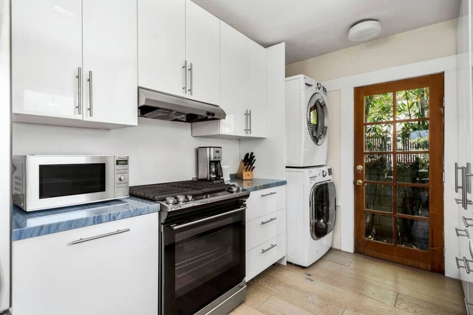 Fully Equipped Kitchen Featuring Sleek Cabinets and Plenty of Storage