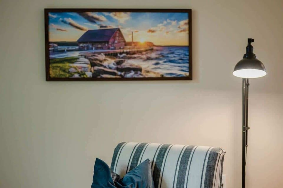 The home is decorated in a modern style bringing in splashes of Door County to it's theme. This comfy chair is perfect for reading or unwinding with a glass of wine after a fun filled day. 