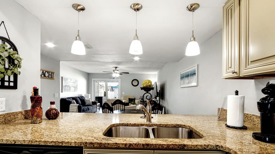 Lower Level: granite countertop in the well designed kitchen