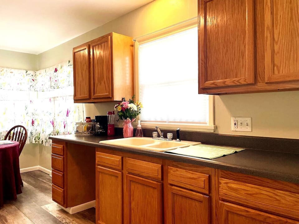 Kitchen with Coffee Maker and Coffee plus Blender and Toaster