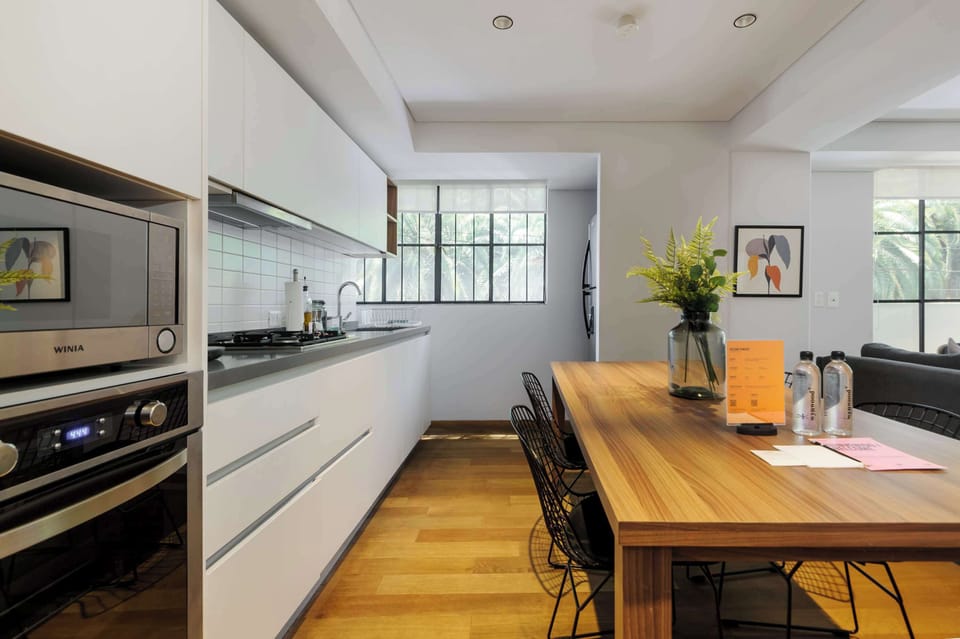 Dining room with natural lighting and a warm atmosphere