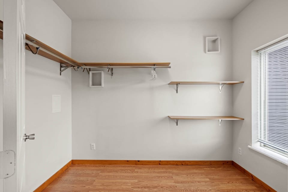 Fully equipped walk-in closet.