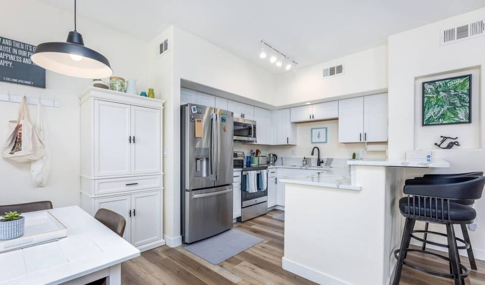 The fully equipped kitchen offers counter space, appliances, and all the essentials needed to cook your meals at home. Pantry staples such as olive oil, spices, coffee, and condiments are provided to minimize your grocery shopping.