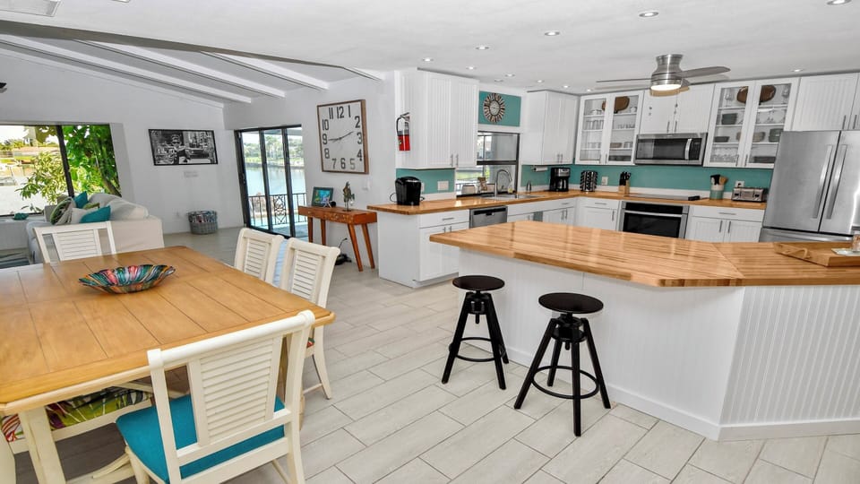 You can eat at the breakfast bar or at the dining table
