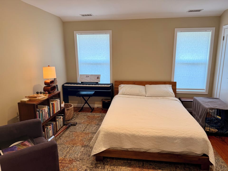 Queen bed in bedroom