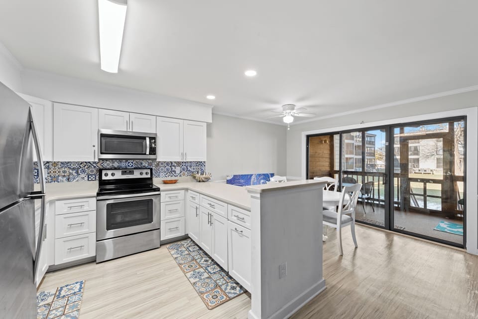 This gorgeous Kitchen is open to the entire Living & Dining area!
