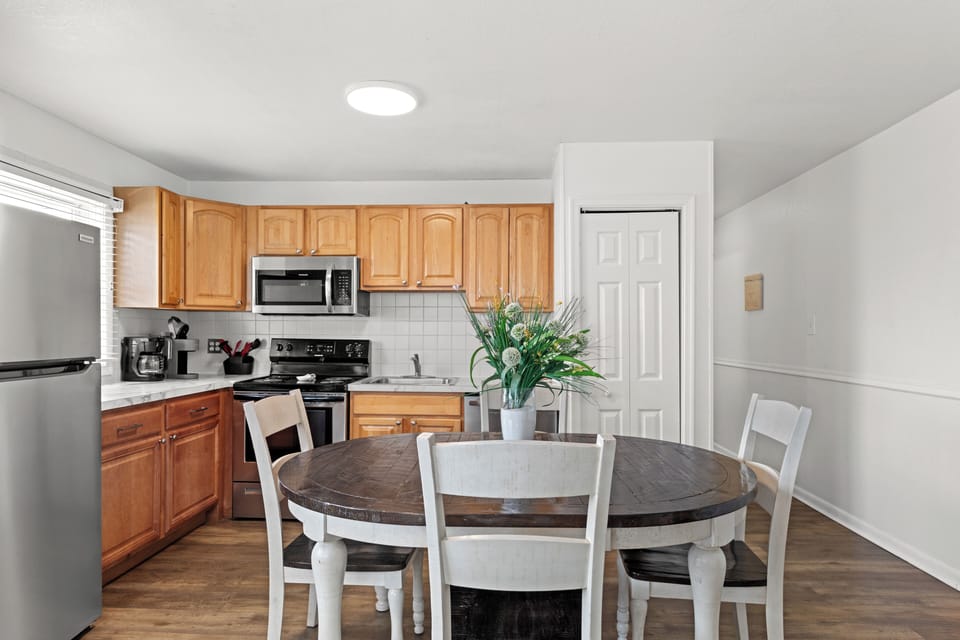 Gather for a home cooked meal at the dining table.