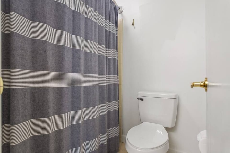 View of the primary bathroom with tub/shower.