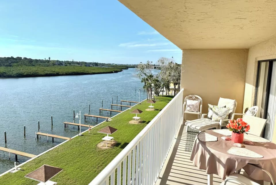 Plenty of seating available on the balcony to relax or enjoy a meal outside. 