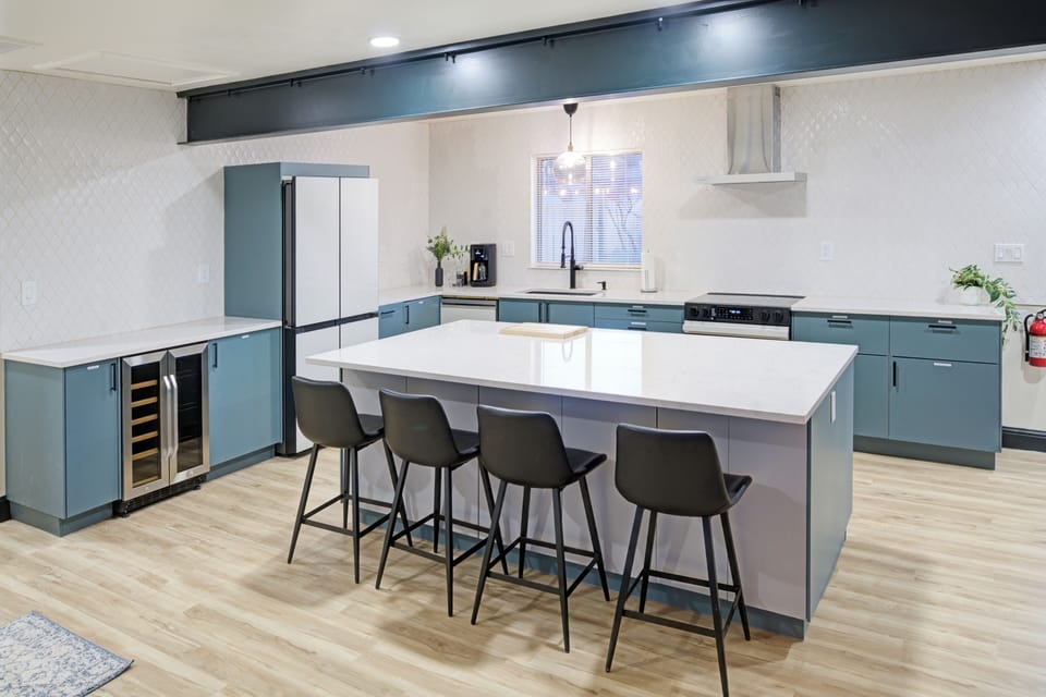 Large kitchen with high end appliances, filtered water, coffee & essentials