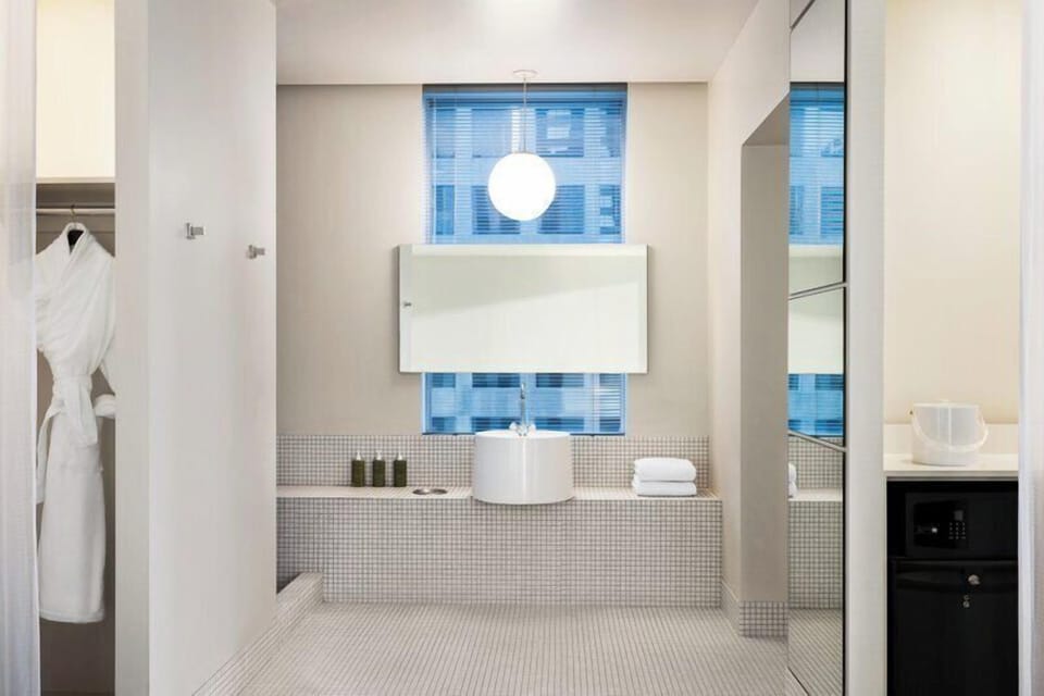 Get ready with a sleek vanity and thoughtfully placed essentials.