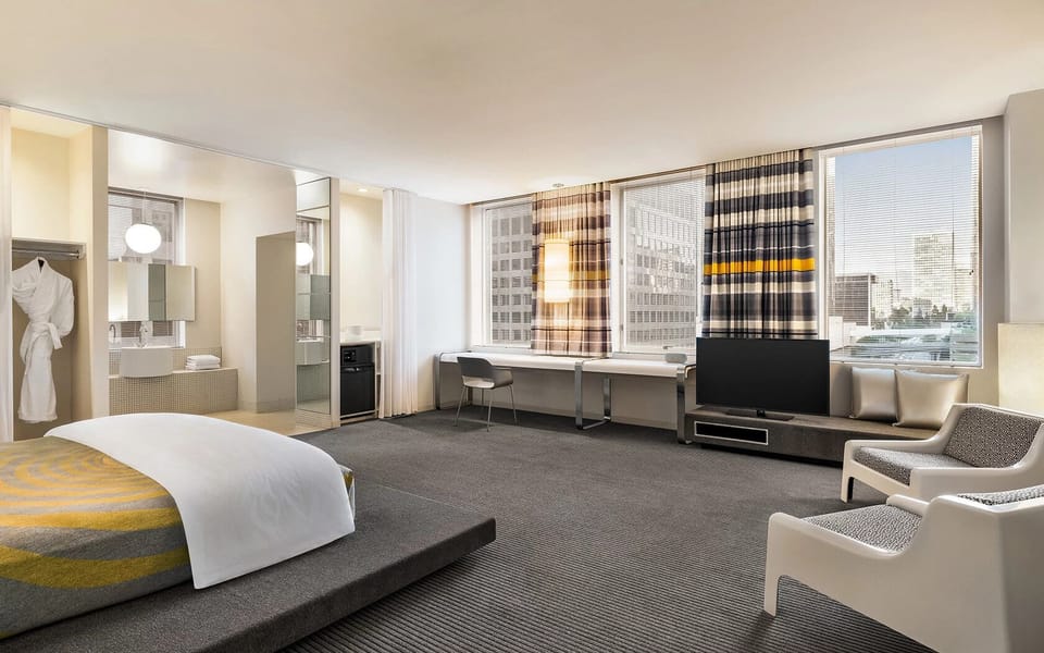 Lounge comfortably with extra seating and wide-window daylight.
