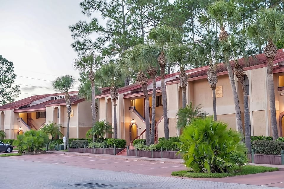 Picture effortless getaways across breezy, resort-style exterior walkways.