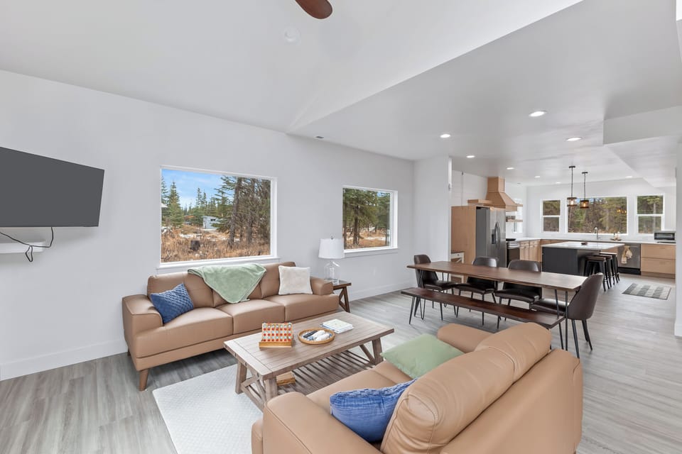 Spacious open layout with seamless flow between living, dining, and kitchen.