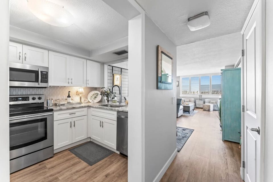 Front Door View - Kitchen on your left, Half Bath on the right