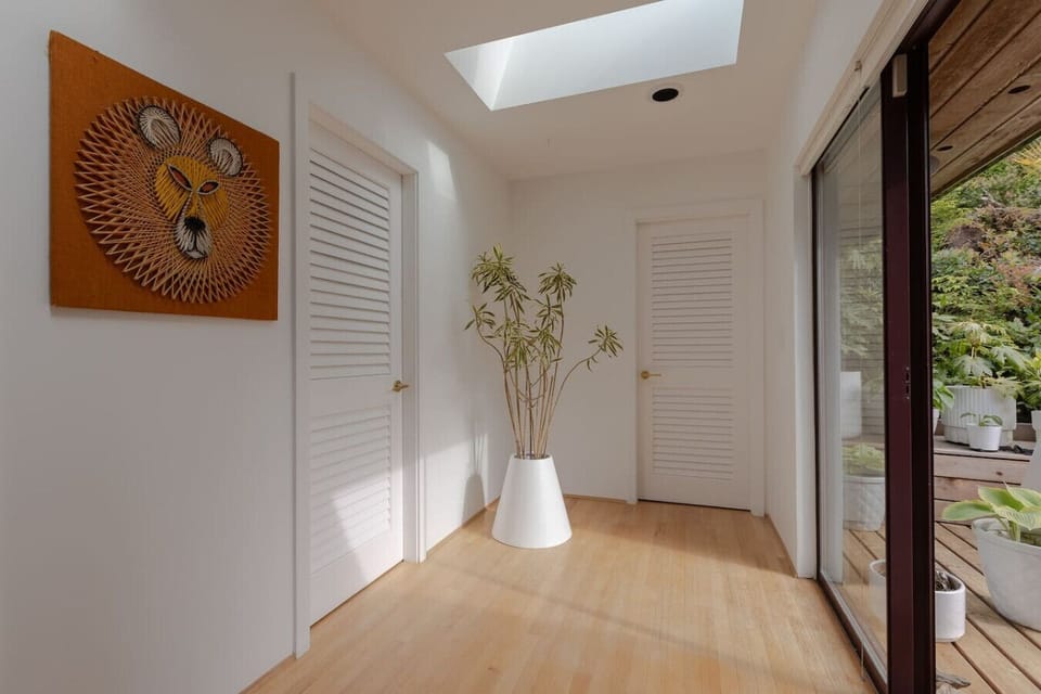 Hallway - 2nd bathroom on the left, second bedroom  straight ahead and patio door to the right.