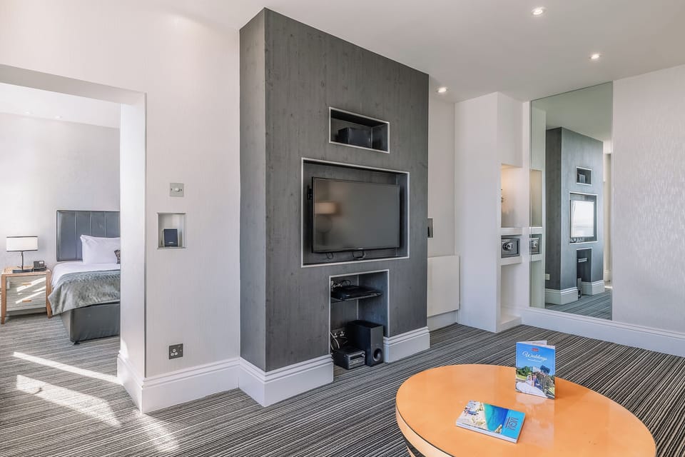 Gather comfortably in the lounge with sleek built-in media wall.
