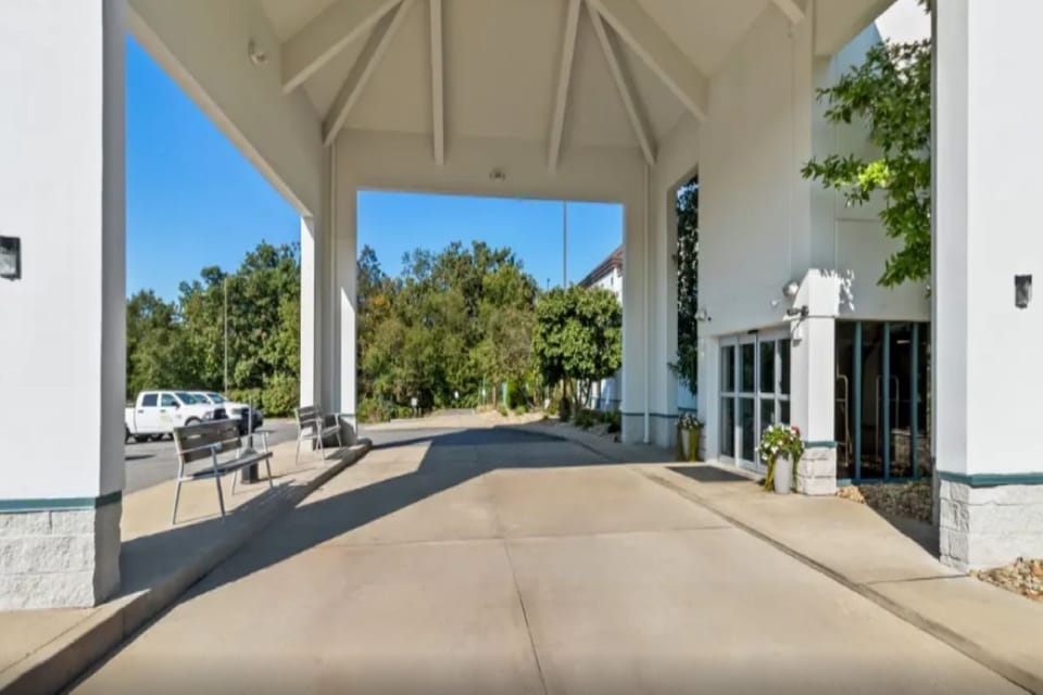 Arrive with ease under a bright, welcoming covered entrance