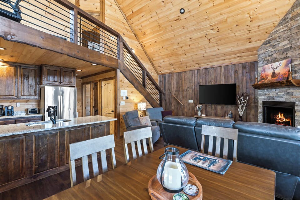 The open floor plan creates a seamless blend of living, dining, and kitchen areas, making every corner feel connected and inviting.